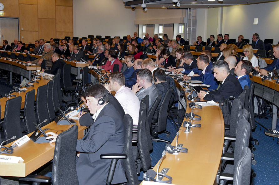 A photo of paticipants at an European Security Seminar.